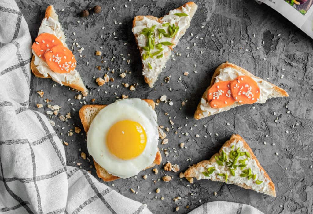Egg toast breakfast on grey table 